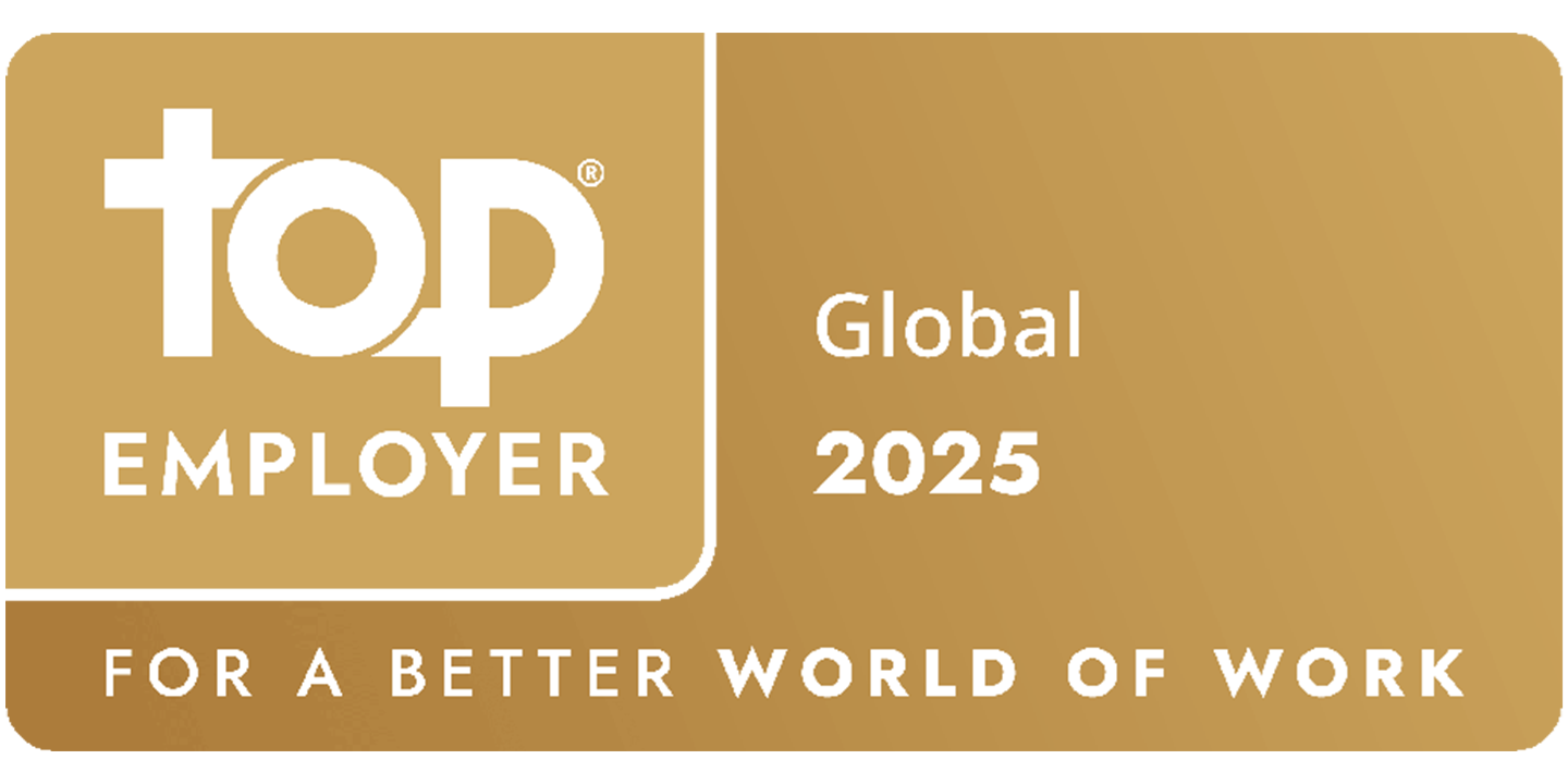 Gold plaque with Top Employer Global 2025 text, featuring a stylised top logo. Below, it reads For a Better World of Work. The background has a gradient of darker to lighter gold tones.