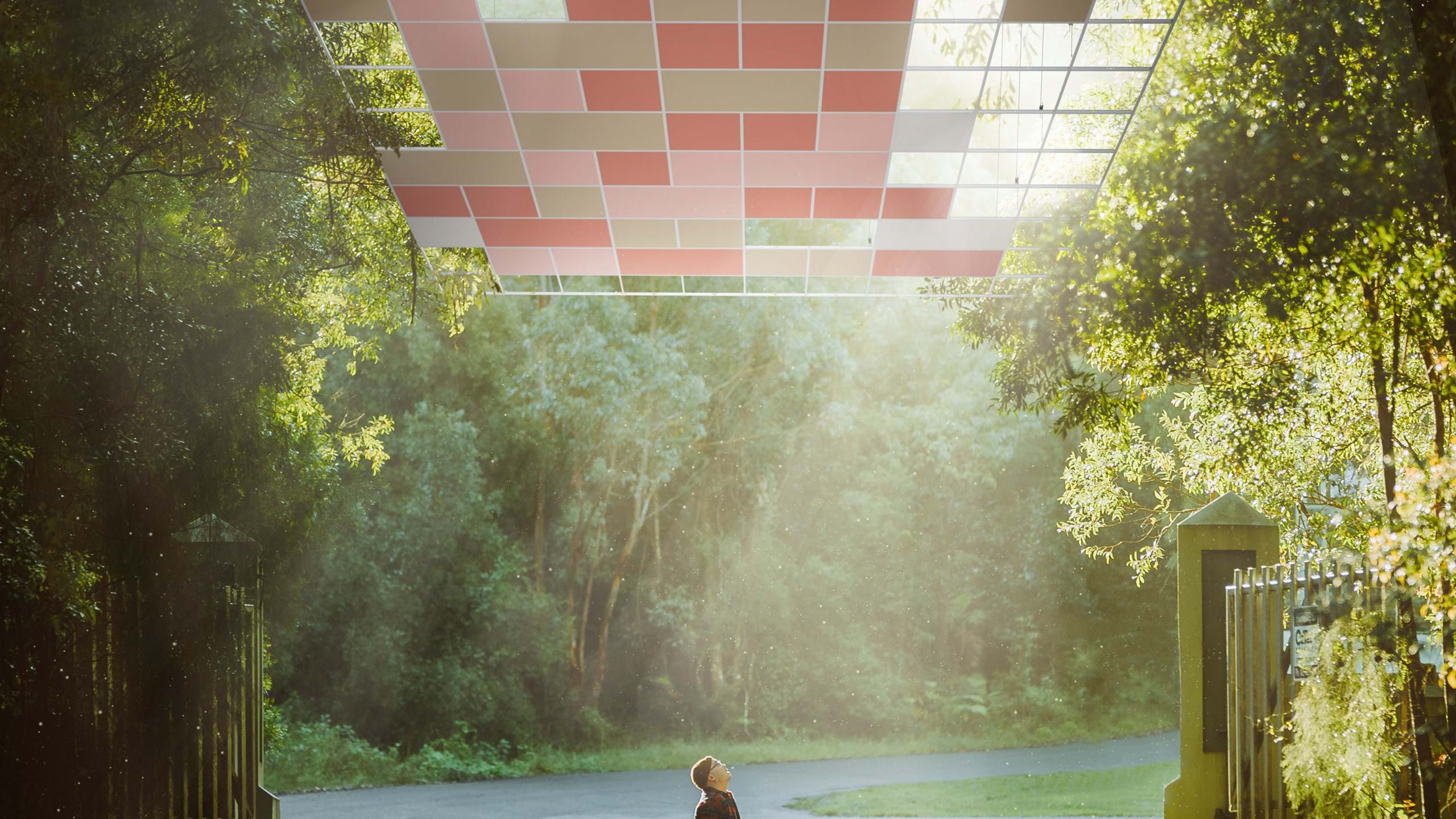 Man sitting on the ground and acoustic ceiling in the sky stairing up at