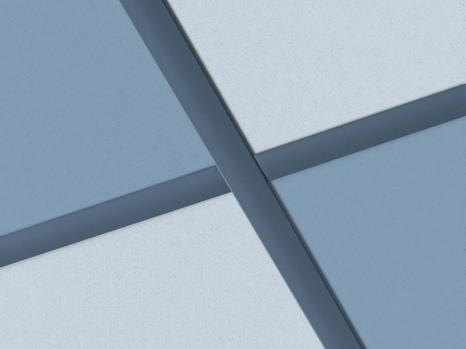 Acoustic tiles and ceiling grid in different blue colours
