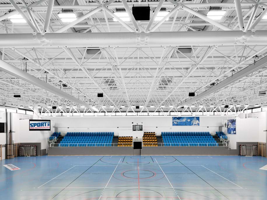 Suspended acoustic ceiling in sports hall