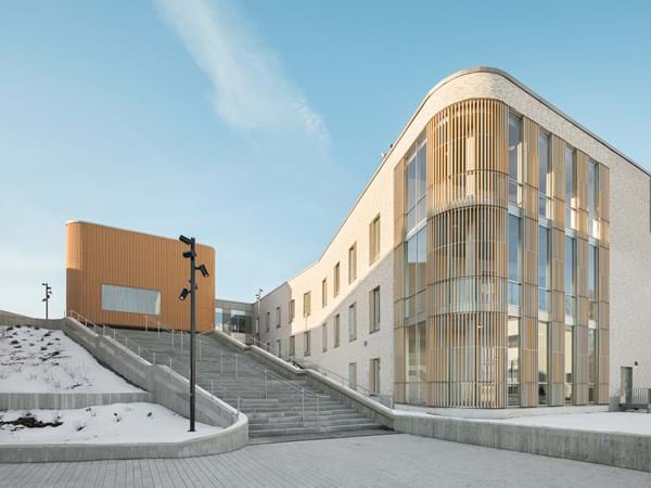 Exterior of Tampere University Hospital and a long staircase leading up to the hospital entrance