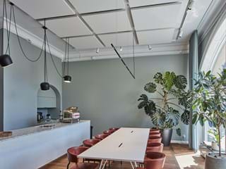 Acoustic free hanging ceiling panels in office socialising area