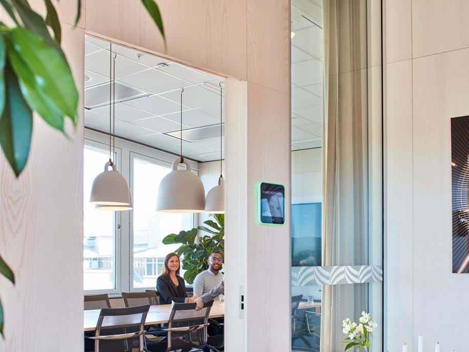 Office meeting room with acoustic suspended ceiling