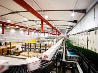 Acoustic ceiling in room with conveyor belt