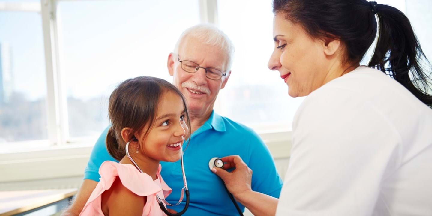 Doctor examining her patient