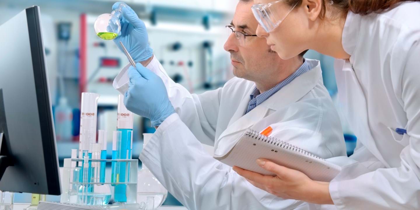 Researchers discuss with each other