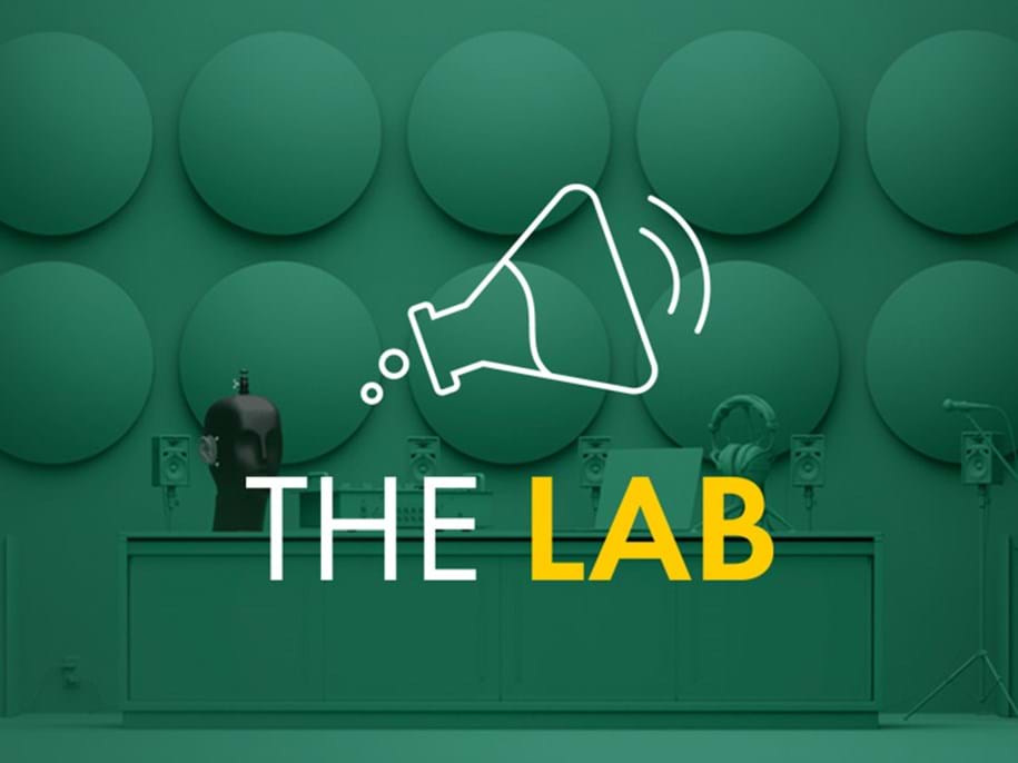 A graphic with a green background featuring circular shapes. An outline of a laboratory flask emitting sound waves is next to the text THE LAB, with THE in white and LAB in yellow.