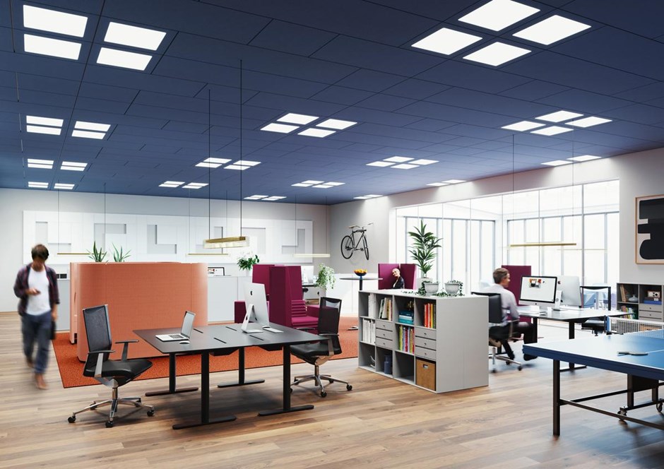 Open space office with blue acoustic ceiling system with integrated lighting