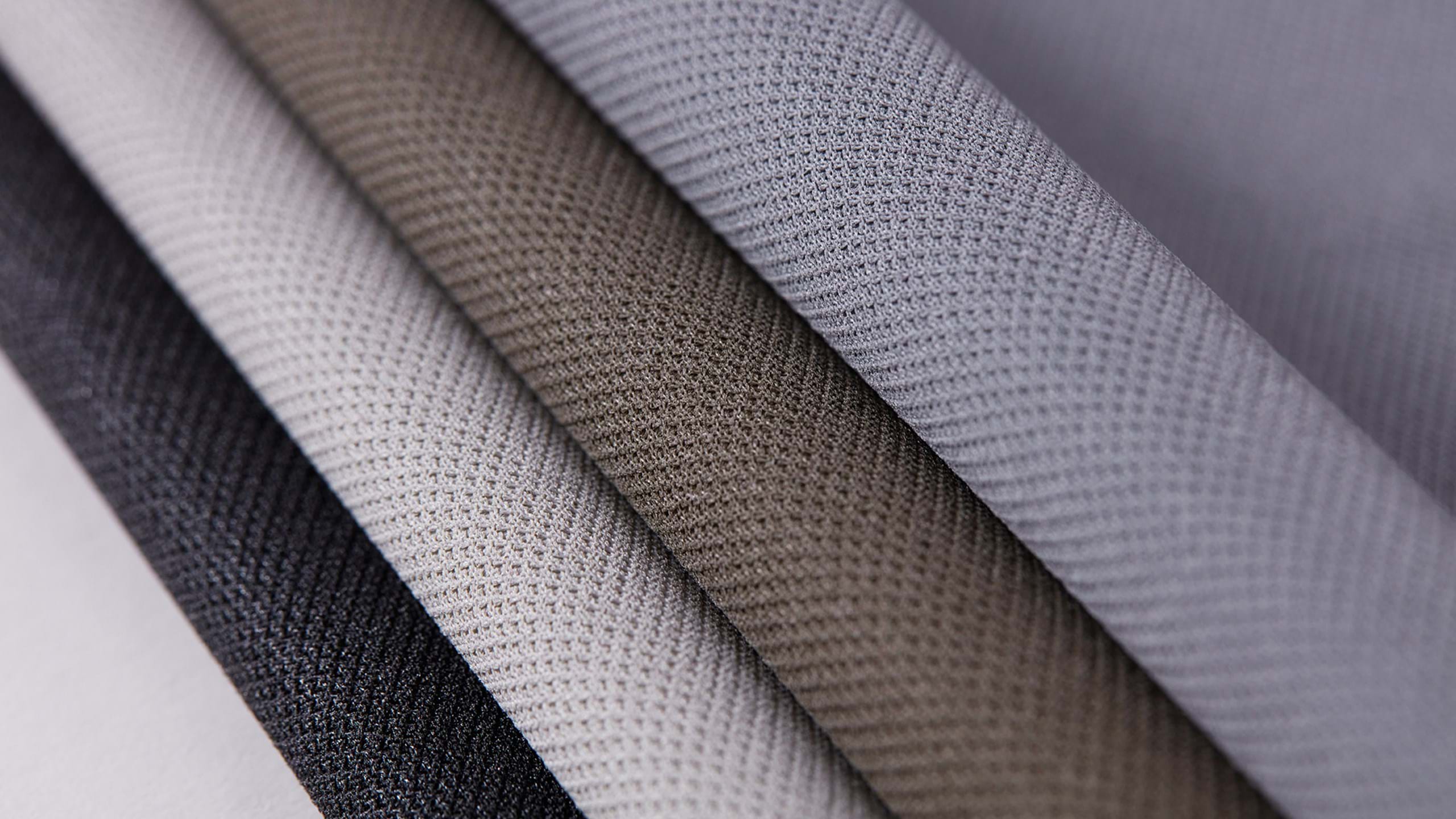 Close-up of Clipso stretch fabric in different colours