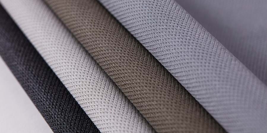 Close-up of Clipso stretch fabric in different colours
