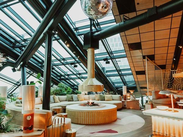 Hotel lounge area with suspended acoustic ceiling