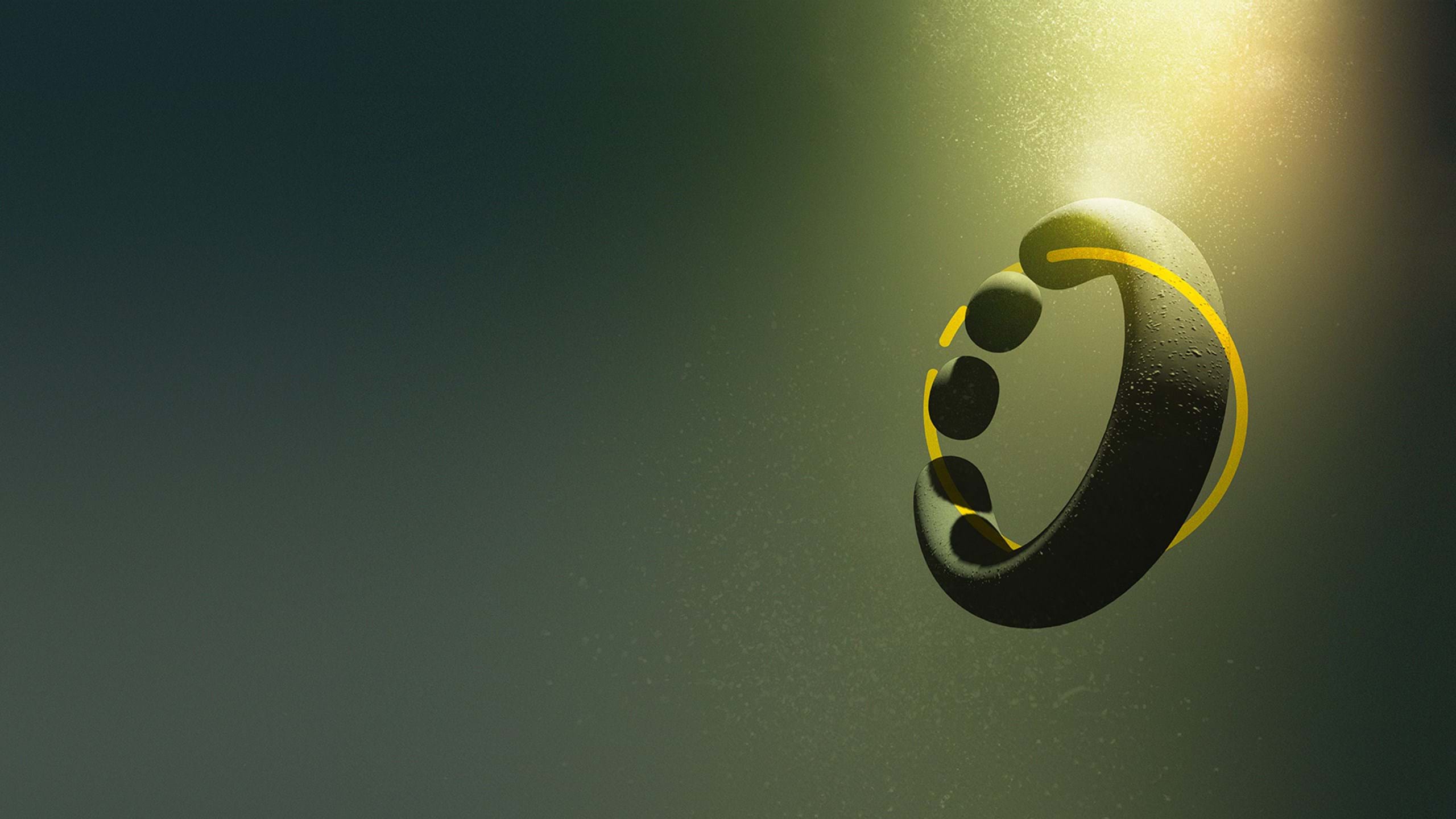 Green, graphical circle in green water with light coming in from above