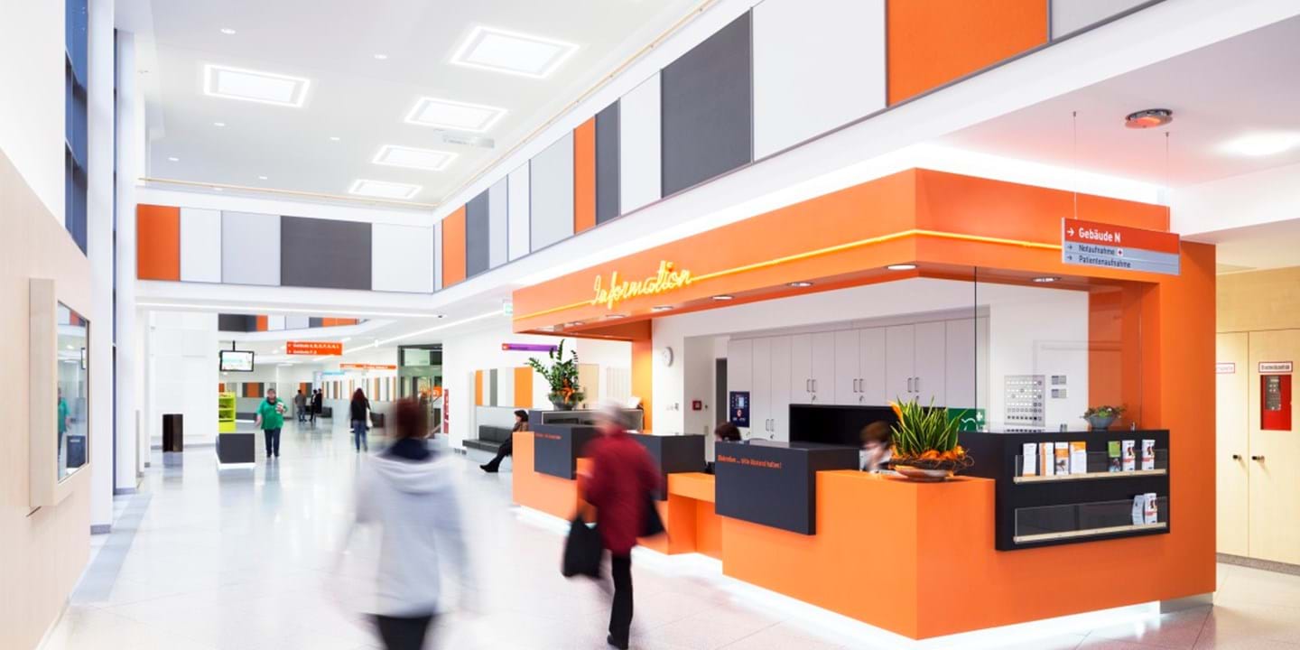 People walking in a large entrance